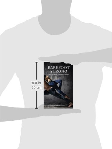 A photo showing the size of the Barefoot Strong book: 8 inches or 20 centimeters tall